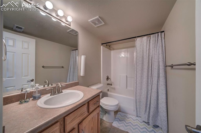 bathroom with visible vents, shower / tub combo, vanity, tile patterned floors, and toilet