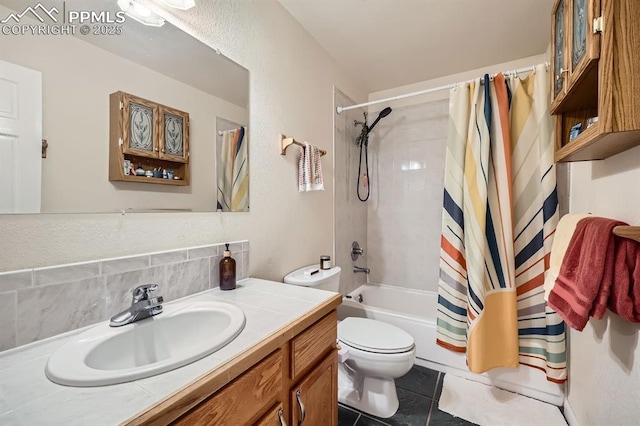 119 Bristlecone Ln, Fairplay, CO 80440 - full bath with vanity, toilet, tile patterned floors, shower / tub combo, and tasteful backsplash
