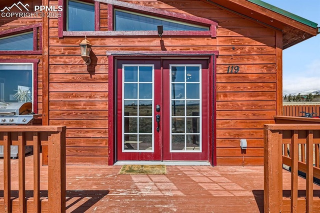 119 Bristlecone Ln, Fairplay, CO 80440 - view of exterior entry featuring a wooden deck and french doors