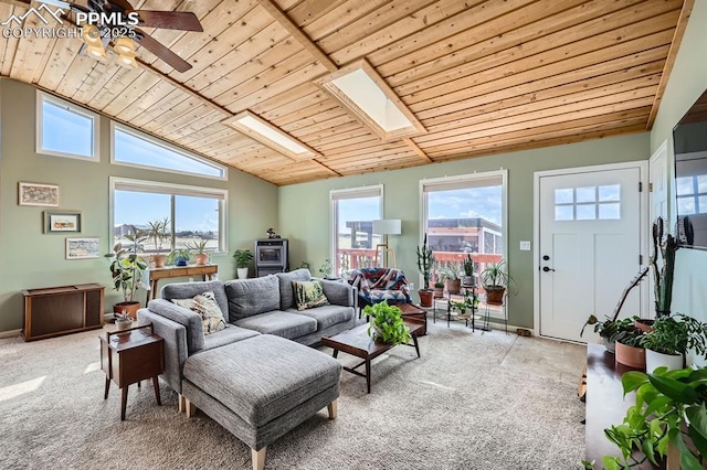 119 Bristlecone Ln, Fairplay, CO 80440 - living room featuring light colored carpet, ceiling fan, and a wealth of natural light