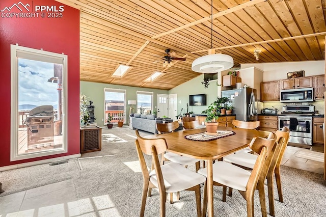 119 Bristlecone Ln, Fairplay, CO 80440 - dining space featuring wooden ceiling, ceiling fan, vaulted ceiling, and light colored carpet