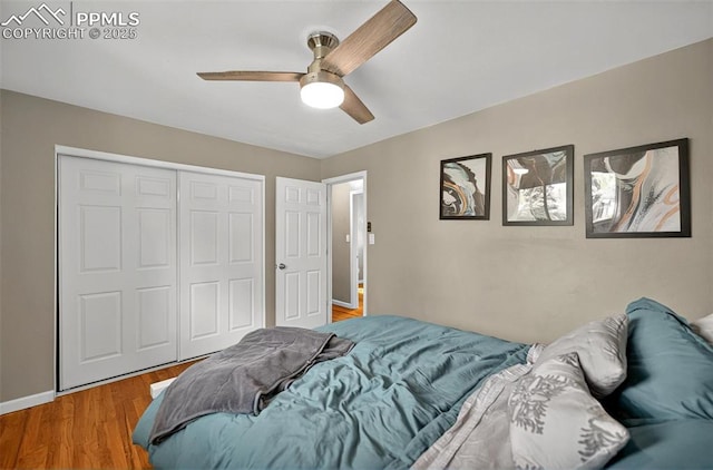 806 N Chelton Rd, Colorado Springs, CO 80909 - bedroom with a closet, wood finished floors, a ceiling fan, and baseboards