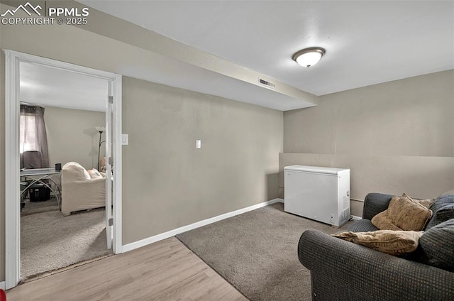 806 N Chelton Rd, Colorado Springs, CO 80909 - living area with wood finished floors and baseboards