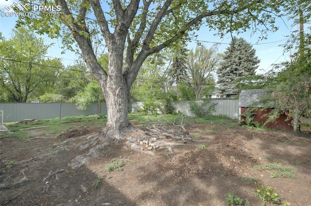 806 N Chelton Rd, Colorado Springs, CO 80909 - fenced backyard with a shed and an outbuilding