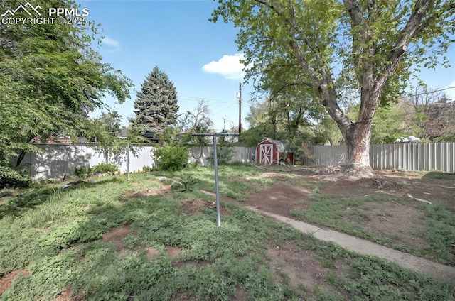 806 N Chelton Rd, Colorado Springs, CO 80909 - fenced backyard featuring a shed and an outdoor structure