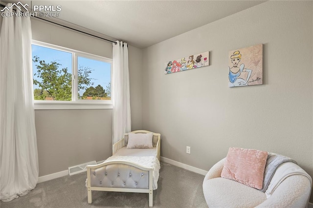 living area featuring baseboards, carpet, and visible vents
