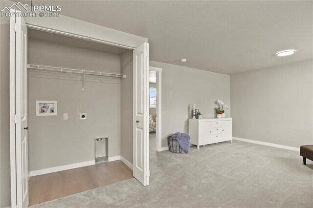 921 Holmes Dr, Colorado Springs, CO 80909 - laundry room featuring laundry area, hookup for a washing machine, carpet floors, baseboards, and electric dryer hookup