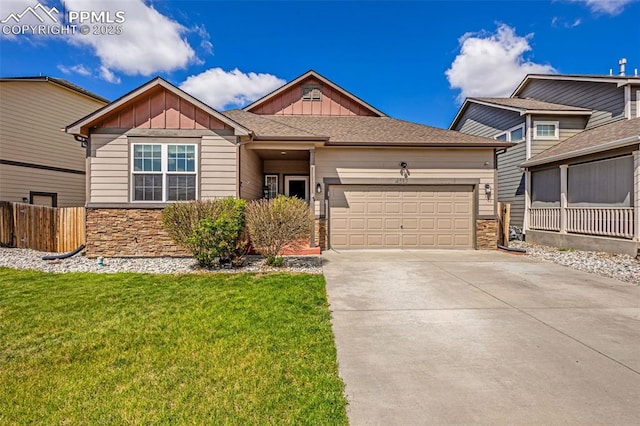 craftsman-style home with board and batten siding, a garage, stone siding, and concrete driveway