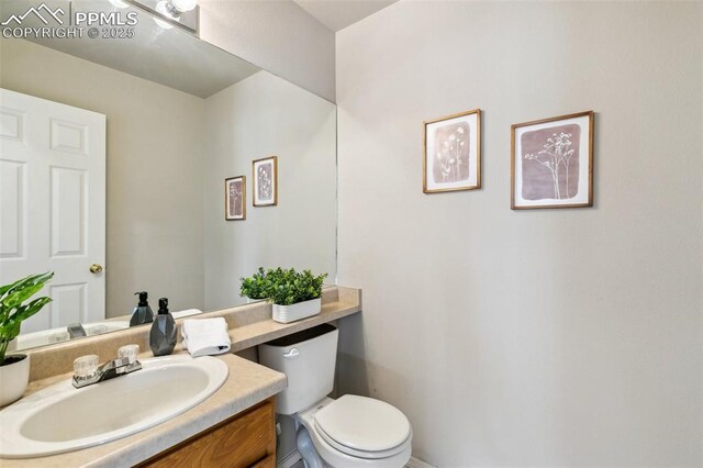 7665 Calloway Ct, Colorado Springs, CO 80919 - bathroom featuring vanity and toilet