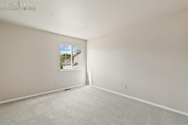 7665 Calloway Ct, Colorado Springs, CO 80919 - carpeted empty room featuring baseboards