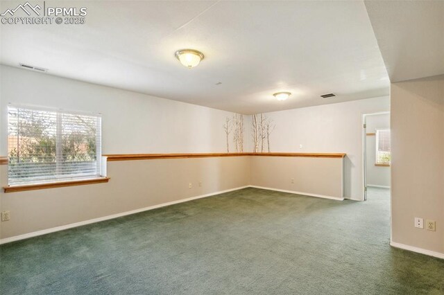 7665 Calloway Ct, Colorado Springs, CO 80919 - carpeted spare room featuring baseboards