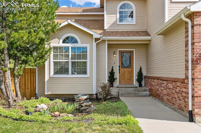 7665 Calloway Ct, Colorado Springs, CO 80919 - entrance to property with fence and a shingled roof