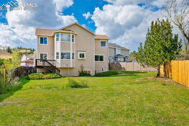 7665 Calloway Ct, Colorado Springs, CO 80919 - back of house featuring stairway