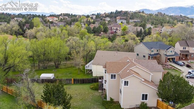 7665 Calloway Ct, Colorado Springs, CO 80919 - aerial perspective of suburban area with mountains