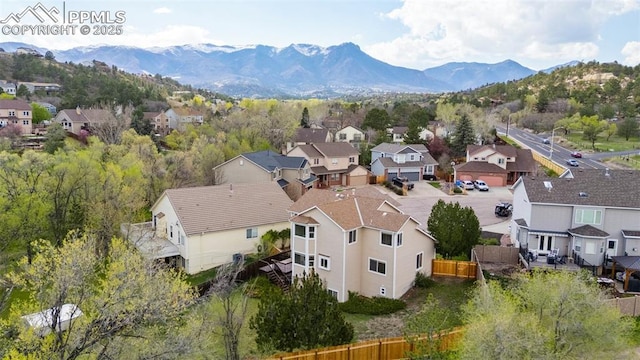 7665 Calloway Ct, Colorado Springs, CO 80919 - aerial perspective of suburban area with a mountainous background