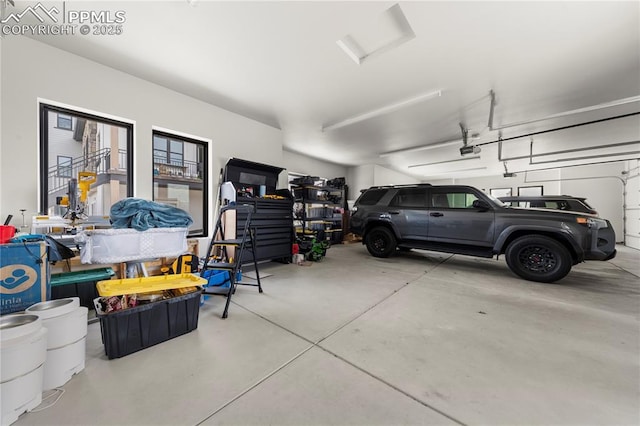 garage featuring a garage door opener