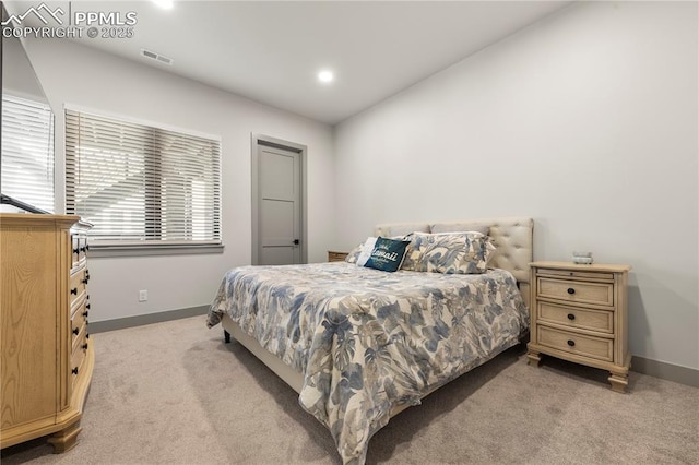bedroom featuring baseboards, light colored carpet, recessed lighting, and visible vents