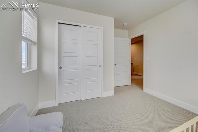 9773 Marble Canyon Way, Peyton, CO 80831 - unfurnished bedroom featuring carpet floors, baseboards, and a closet