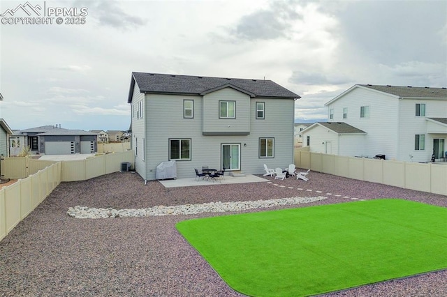 9773 Marble Canyon Way, Peyton, CO 80831 - back of house with a patio area, central air condition unit, and a fenced backyard