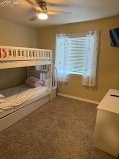 6290 Pilgrimage Rd, Colorado Springs, CO 80925 - carpeted bedroom featuring baseboards and a ceiling fan