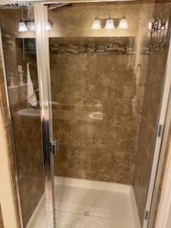 6290 Pilgrimage Rd, Colorado Springs, CO 80925 - bathroom featuring a stall shower