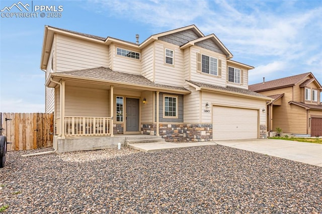 view of front facade featuring fence, a shingled roof, a garage, a porch, and concrete driveway