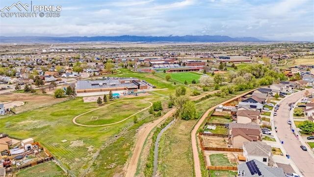bird's eye view with a residential view and a mountain view