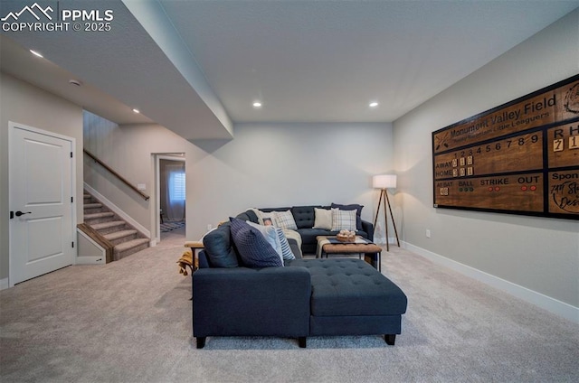 living room featuring stairway, baseboards, carpet flooring, and recessed lighting