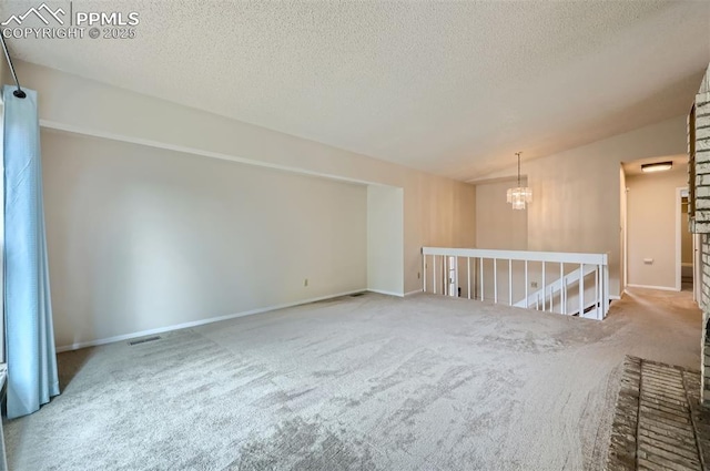 2903 E Serendipity Cir, Colorado Springs, CO 80917 - carpeted empty room with a textured ceiling and baseboards