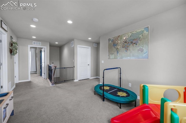 playroom with carpet floors, baseboards, recessed lighting, and visible vents