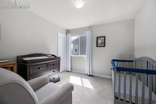 carpeted bedroom with baseboards and visible vents