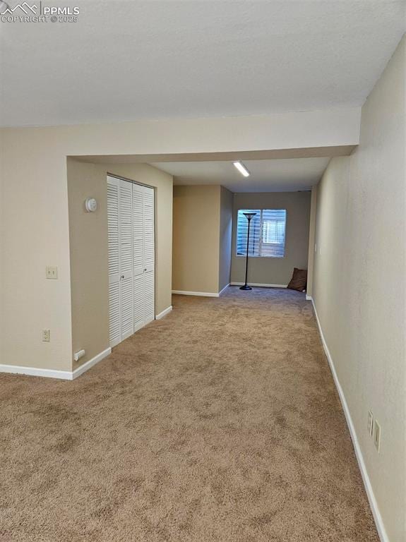 9367 Peaceful Meadow St, Colorado Springs, CO 80925 - empty room featuring carpet floors and baseboards
