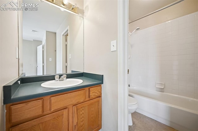 full bathroom featuring vanity, tile patterned floors, shower / bathtub combination, and toilet