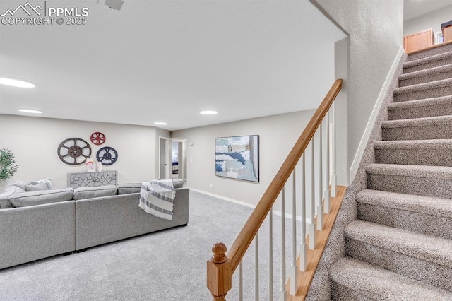 living room with stairs, a textured wall, baseboards, recessed lighting, and carpet flooring