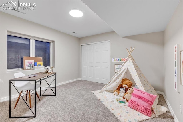 recreation room with baseboards, carpet flooring, and visible vents