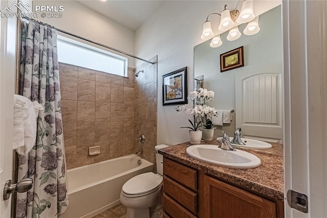 bathroom with shower / bath combo with shower curtain, toilet, and vanity