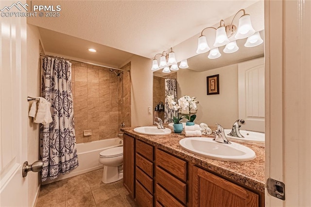 full bath featuring a sink, double vanity, shower / tub combo with curtain, and tile patterned floors