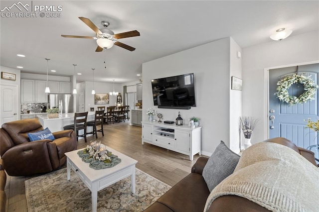 6471 Cisco Kid Way, Colorado Springs, CO 80923 - living area featuring recessed lighting, ceiling fan, and wood finished floors