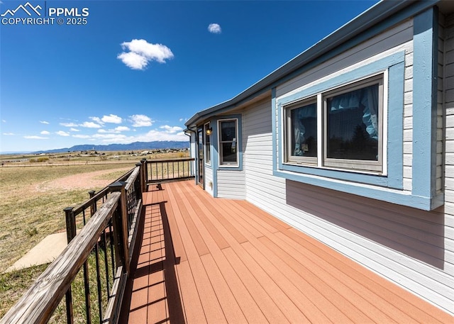 6185 Sayres Rd, Colorado Springs, CO 80927 - deck with a lawn, a mountain view, and a rural view