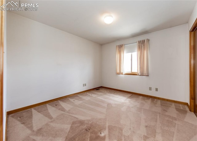 6185 Sayres Rd, Colorado Springs, CO 80927 - spare room featuring baseboards and light colored carpet
