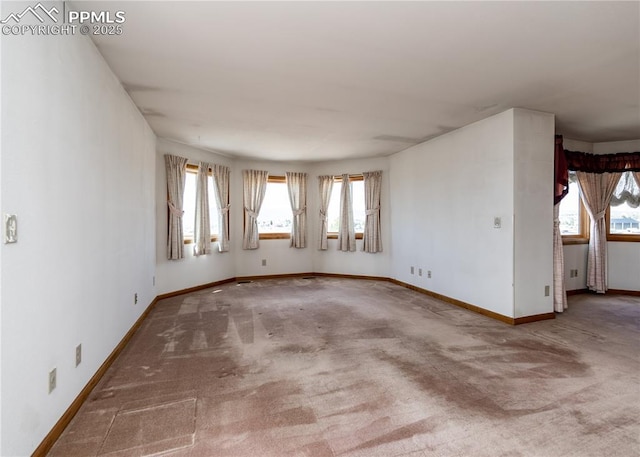 6185 Sayres Rd, Colorado Springs, CO 80927 - unfurnished room featuring carpet floors and a wealth of natural light