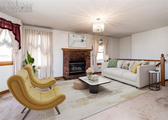 6185 Sayres Rd, Colorado Springs, CO 80927 - living area featuring plenty of natural light, carpet flooring, baseboards, and a chandelier
