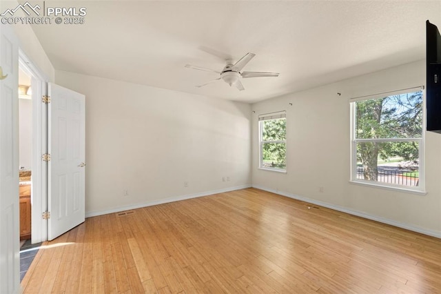 3245 Chestnut Glen Ln, Colorado Springs, CO 80918 - unfurnished room with light wood finished floors and a ceiling fan