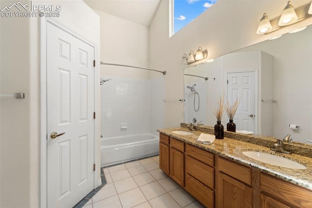 3245 Chestnut Glen Ln, Colorado Springs, CO 80918 - full bath with bathing tub / shower combination, double vanity, tile patterned flooring, and a towering ceiling