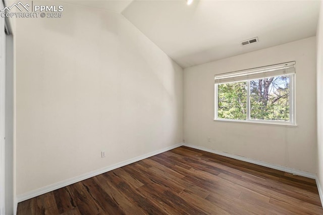 3245 Chestnut Glen Ln, Colorado Springs, CO 80918 - unfurnished room featuring dark wood-type flooring and lofted ceiling