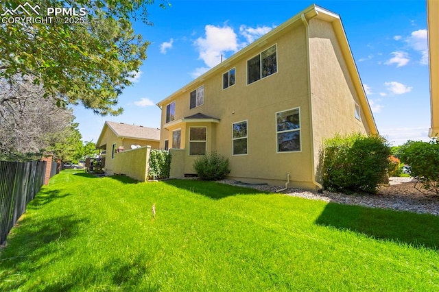 3245 Chestnut Glen Ln, Colorado Springs, CO 80918 - rear view of house with stucco siding