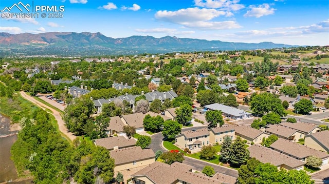 3245 Chestnut Glen Ln, Colorado Springs, CO 80918 - aerial perspective of suburban area with a mountain backdrop