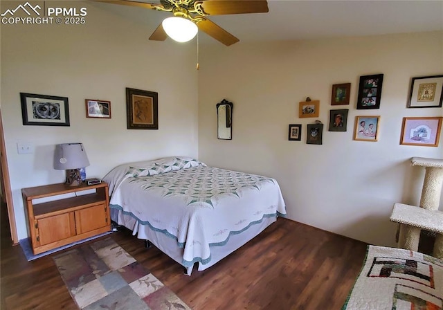 bedroom featuring ceiling fan and dark wood-style floors