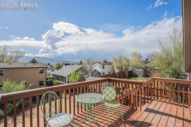 3450 Galleria Ter, Colorado Springs, CO 80916 - wooden terrace with fence and a residential view