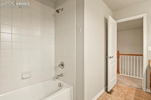 8806 Bella Flora Hts, Colorado Springs, CO 80924 - bathroom featuring  shower combination and baseboards